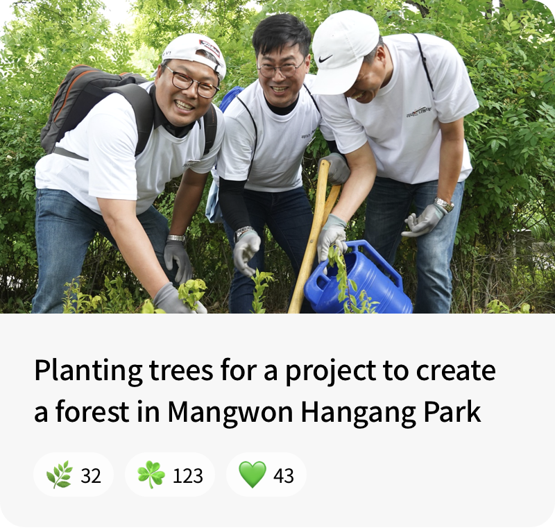 Planting trees for a project to create a forest in Mangwon Hangang Park